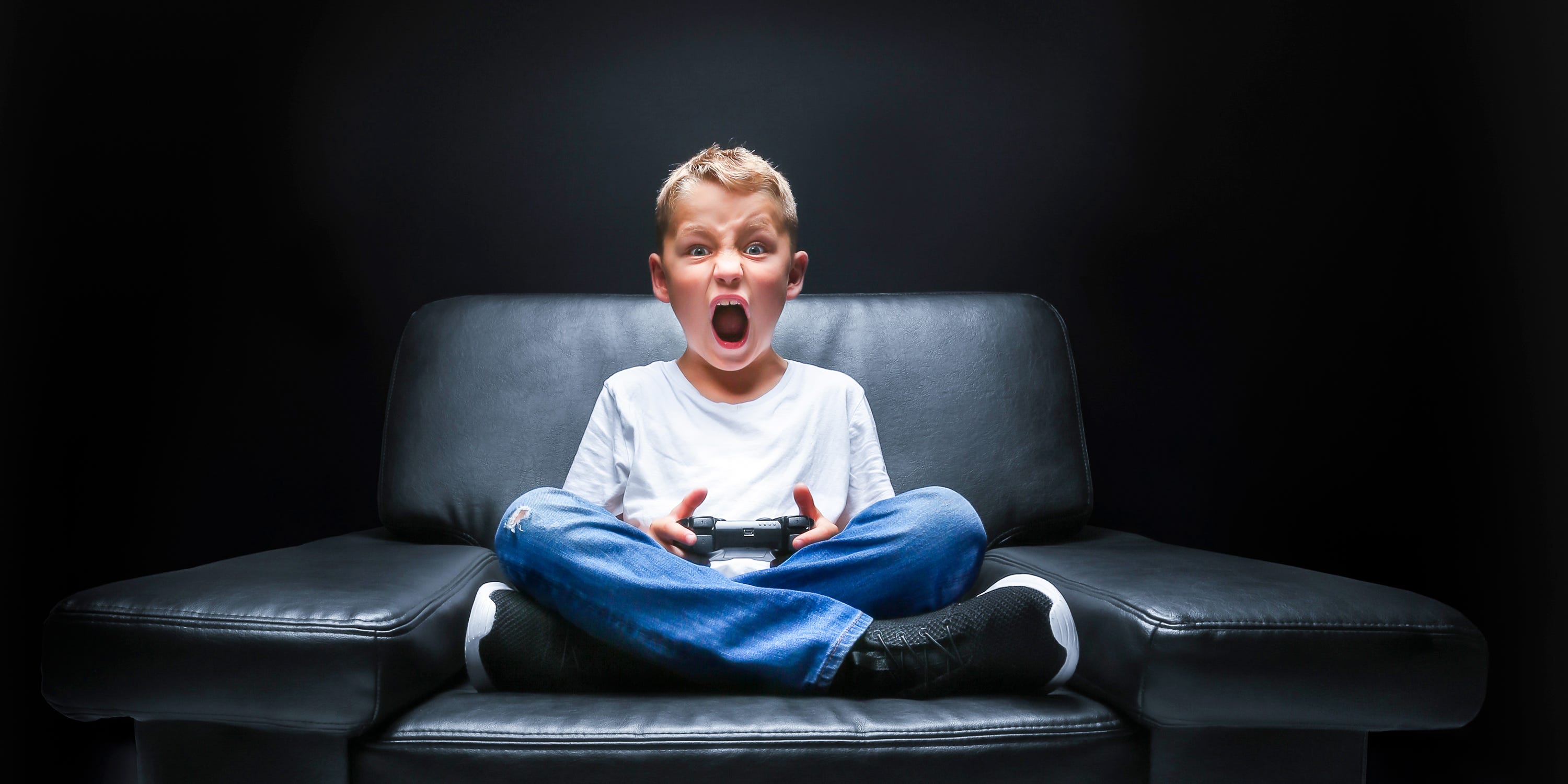 kid playing a video game